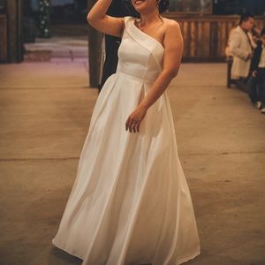 A white satin dress good for wedding or prom.